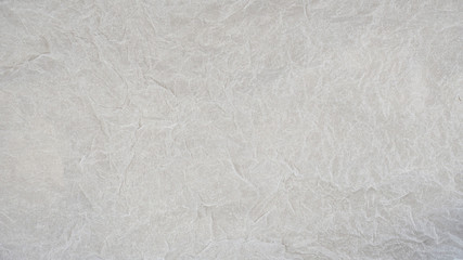 White wrinkled paper. Abstract texture background.