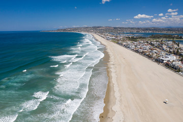 Aerial drone photo of a completely empty Mission Beach due to the Coronavirus and Covid 19 Pandemic. San Diego, Ca, USA.