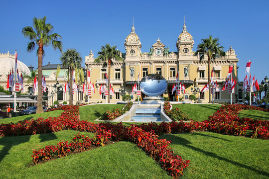 MONTE CARLO, MONACO - JULY 11: Monte Carlo Casino with garden on July 11, 2015 in Monaco. Monte Carlo Casino is a gambling and entertainment complex.