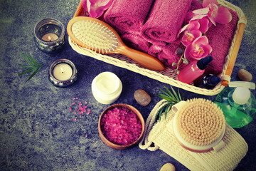 Spa  background. bath products zero waste , sea salt, towels, aroma oil in bottles on grey backdrop...
