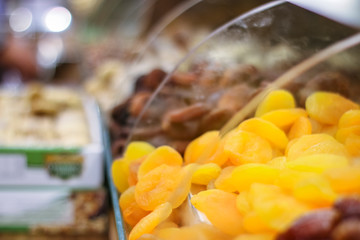 some dried apricots in the display case