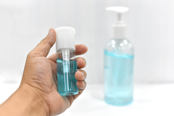 gel alcohol in Hand On a white background or spray alcohol anti bacteria to prevent spread of germs, bacteria and virus. and avoid infections corona virus. Hygiene concept. antibacterial gel sanitizer