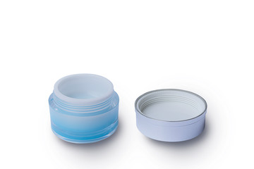 Cosmetic cream bottle isolated white background with clipping path - Blank blue bottle packaging clear cosmetic cream pot and open the lid isolated on white background