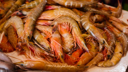 seafood on display for sale in the market 