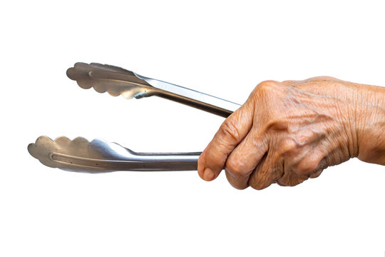 Hand Hold Kitchen Tong Stock Photo - Download Image Now - Serving Tongs,  Tongs - Work Tool, Human Hand - iStock