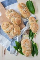 home made bread rolls with wild garlic on a table