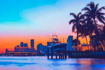 sunset water sea city miami boat blue sky orange sun horizon port ocean buildings skyscrapers sunrise industries dusk dock boat cityscape florida boats © Alberto GV PHOTOGRAP