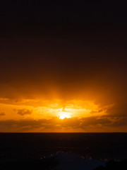 Fototapeta na wymiar Sunrise view over the ocean horizon.