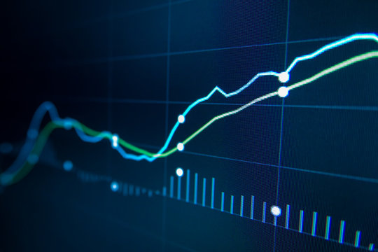 Blue Stock Exchange Market trading graph on screen monitor for economic and financial investment. Business analysis chart display. Stock invest infomation.