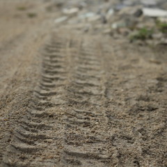 Car wheel marks on the road