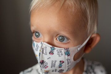 child in medical mask