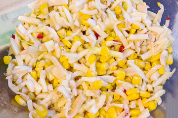 delicious salad made from crab, squid, corn and hot pepper, suitable as background and texture