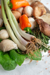 Variety of uncooked wild forest raw mushrooms