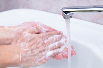 Washing hands with soap