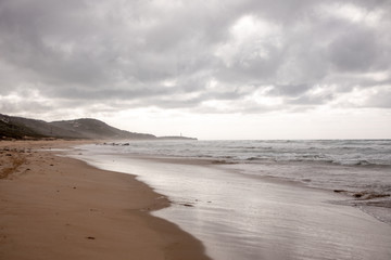 Sandstrand bew&ouml;lkt