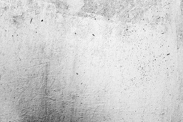 Texture of a concrete wall with cracks and scratches which can be used as a background