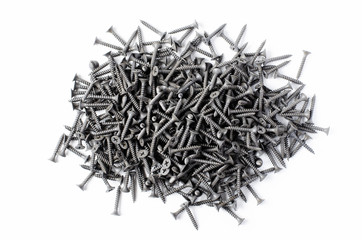 Metal screws on a white background. Tools for fixing and repairing.
