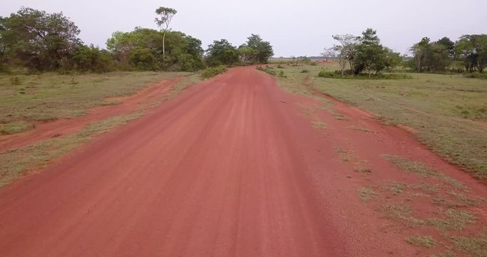 Drone, Air flight over dirt road in Vichada / Colombia.