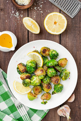 Homemade roasted brussel sprouts with parmesan cheese and butter sauce