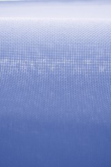 Fabric background, blue textured surface. Space for text.