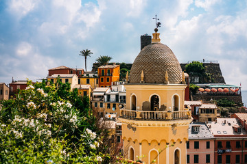 The Santa Margherita di Antiochia Church, the medieval Doria Castle and marina on a beautiful sunny...