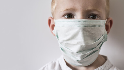Child in medical mask. Virus protection concept. CoVid19.