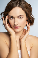 Portrait of pretty woman that posing on camera