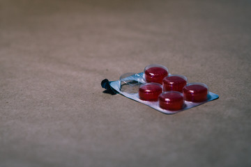 Pills on kraft paper. The theme of health and healing