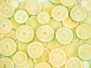 Background of fresh lemon slices.