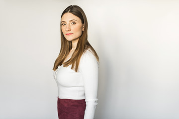 girl stands on a white background