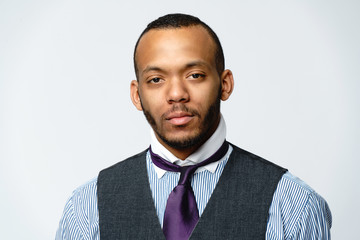 African-American man face portrait over grey background