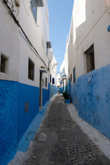 Fototapeta premium Blue painted cozy street in old city of Rabat,Morocco.