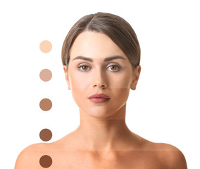 Beautiful young woman with different shades of skin on white background