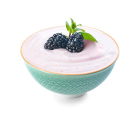 Bowl with tasty yogurt and berries on white background