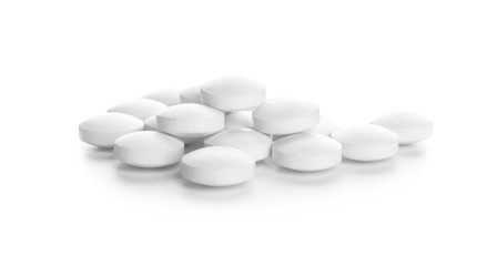 Heap of pills on white background