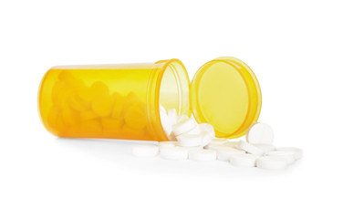 Jar with pills on white background