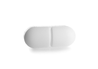 One pill on white background