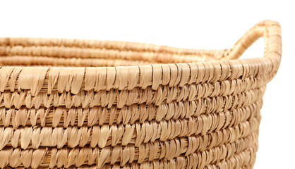 Wicker basket on white background, closeup