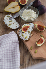 whole grain bread with curd cheese seeds and figs