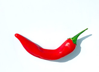 red small hot pepper, on a white background, shadow