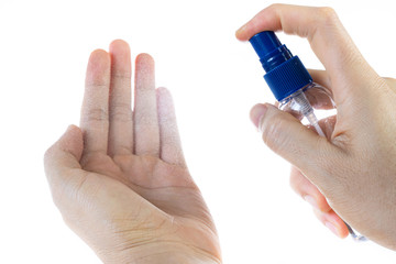 Close up of hands wash by alcohol  spray for prevention coronavirus disesse 2019 (COVID-19), bacteria and germ, health care concept 