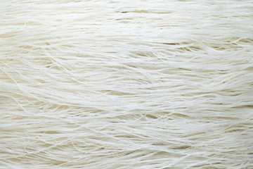 Rice noodles closeup background texture.