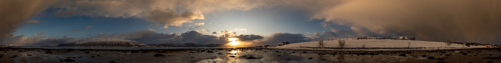The sun is breaking through the clouds