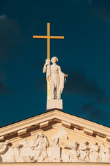 Vilnius, Lithuania. Close View Of Statue Of St. Helena With Cross On Roof Of Cathedral Basilica Of St Stanislaus And St Ladislaus