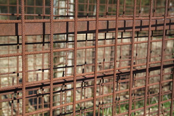 Rusty metallic concrete armature pile