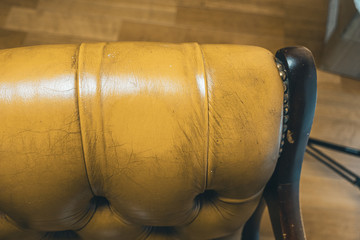 We maintained an antique leather chair.