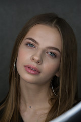 Fototapeta premium girl smile portrait earrings youth beauty model look hands