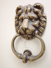 Metal lock on the door of the house 