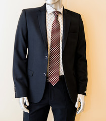 Details of men's clothing, tie jacket and shirt.