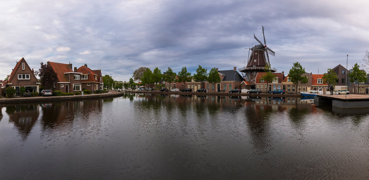 Water canal in Meppel, Holland at sunrise. The background is the sky with clouds.